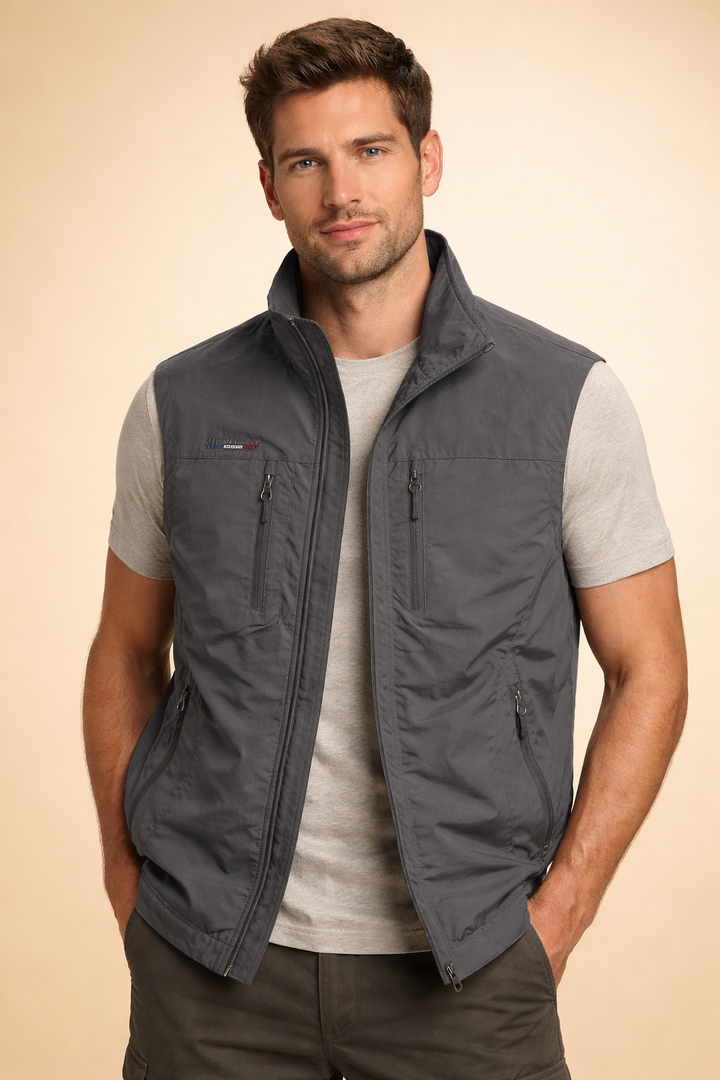 Men's multi-pocket gilet, a practical bodywarmer for outdoor adventures & easy layering. Ample storage.