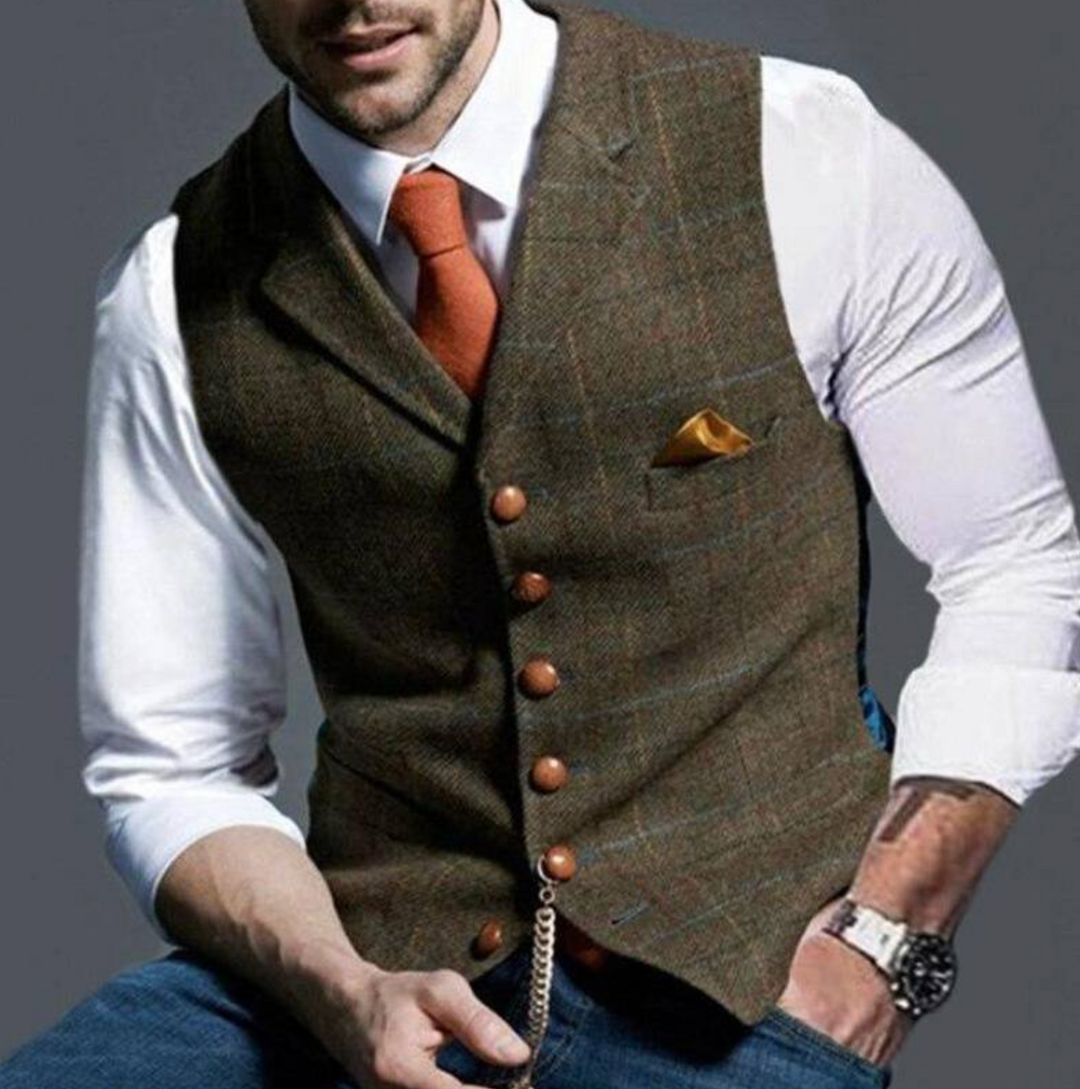 Detail shot of buttons on a men's classic vintage vest, a timeless wardrobe essential.