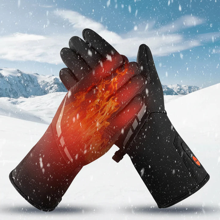 Man wearing touchscreen heated gloves while skiing in cold weather