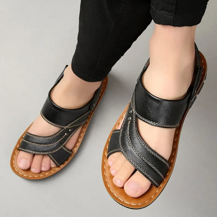 Slip-resistant men's comfort sandals, perfect for summer adventures. Stylish open-toe design for warm weather.