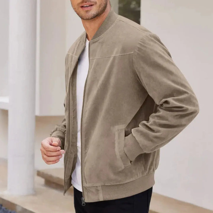 Lightweight men's casual bomber jacket featuring a ribbed collar and convenient zip pockets. Everyday fashion.