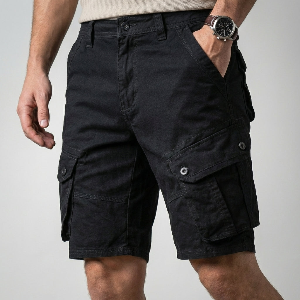Men's relaxed fit knee-length cargo shorts with secure flap pockets, ideal for casual summer wear.