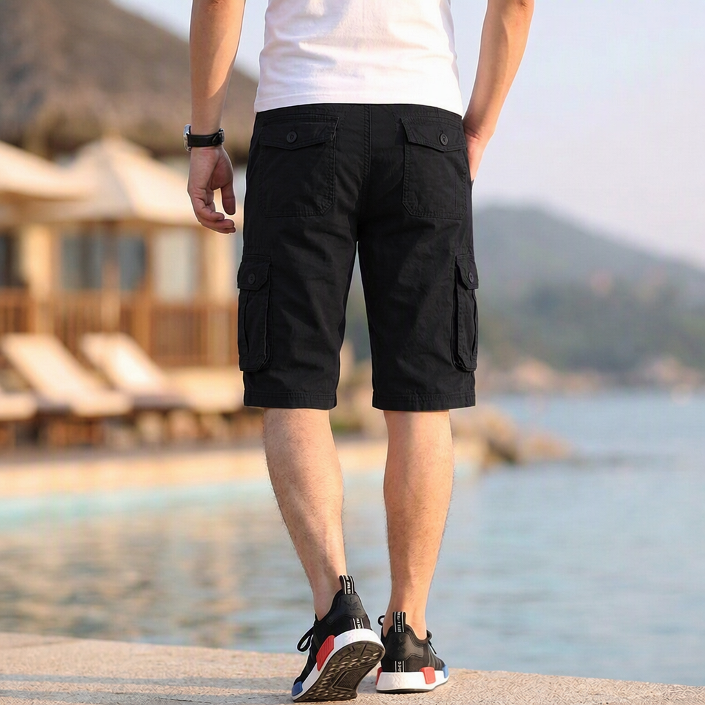 Khaki men's relaxed fit cargo shorts, knee-length, featuring utility pockets for daily essentials & travel.