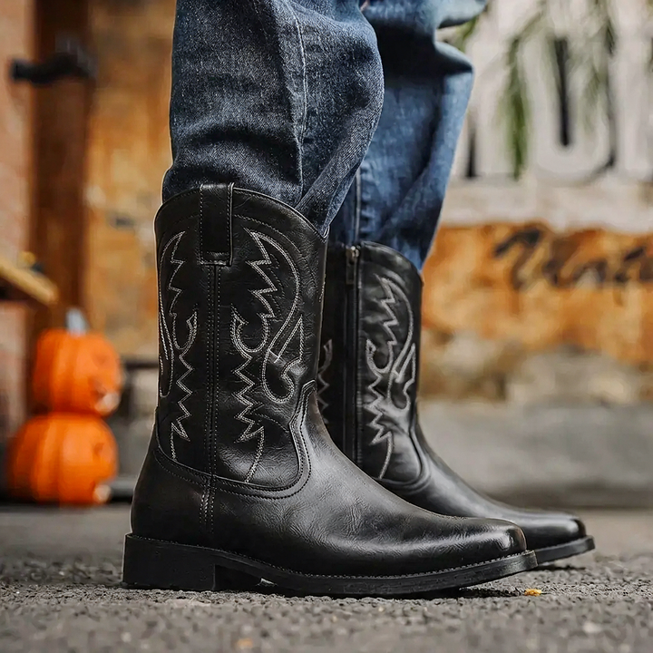 Men's classic tall cowboy boots, western riding style. Rugged pull-on design with a sharp pointed toe.