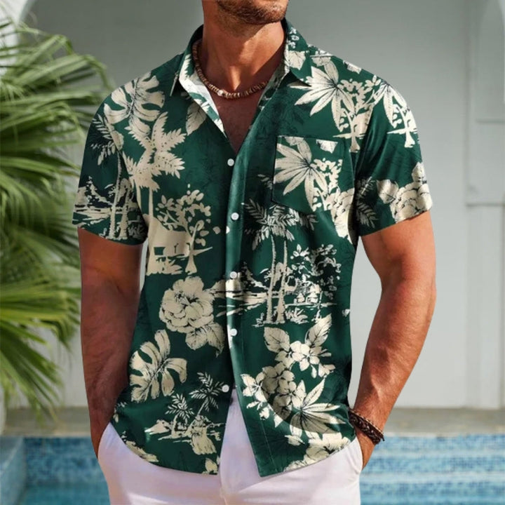Vibrant floral short-sleeve men's Hawaiian shirt. A trendy button-up for summer, beach trips, and casual resort wear.