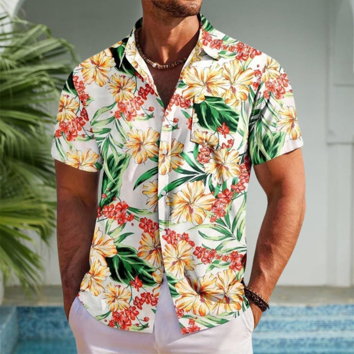 Men's vibrant floral print Hawaiian shirt. This short-sleeve top is perfect for island style, summer, beach, or vacation.