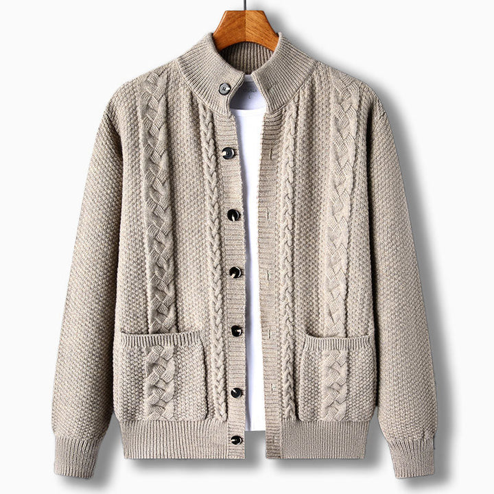 Warm men's cable knit cardigan, stand collar style. Chunky knit texture, button front for winter wear comfort.