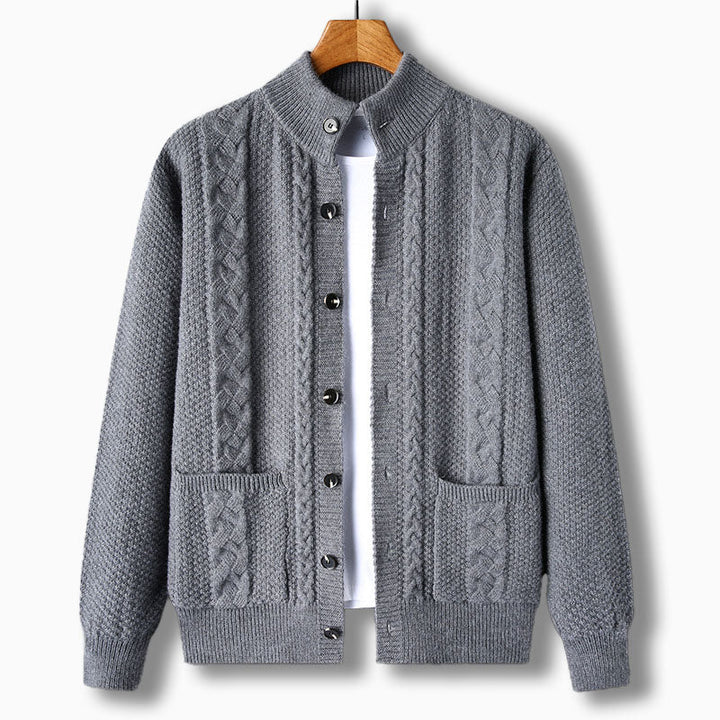 Men's classic cable knit cardigan, stand collar, button closure. Essential for cold weather layering.