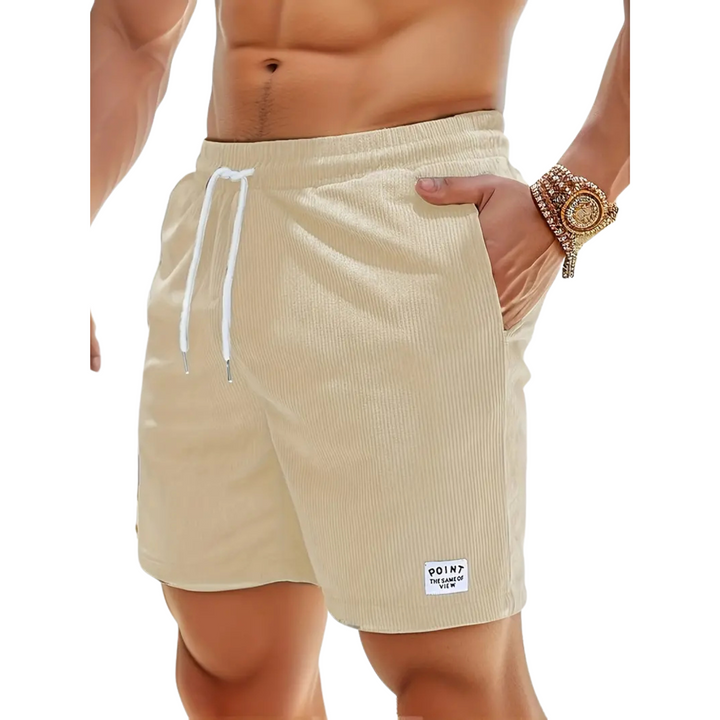 Full length shot of men's comfortable elastic waist swim shorts, essential summer beachwear.