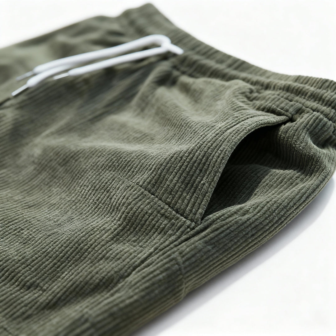Comfortable men's drawstring swim shorts with elastic waist for active summer wear.