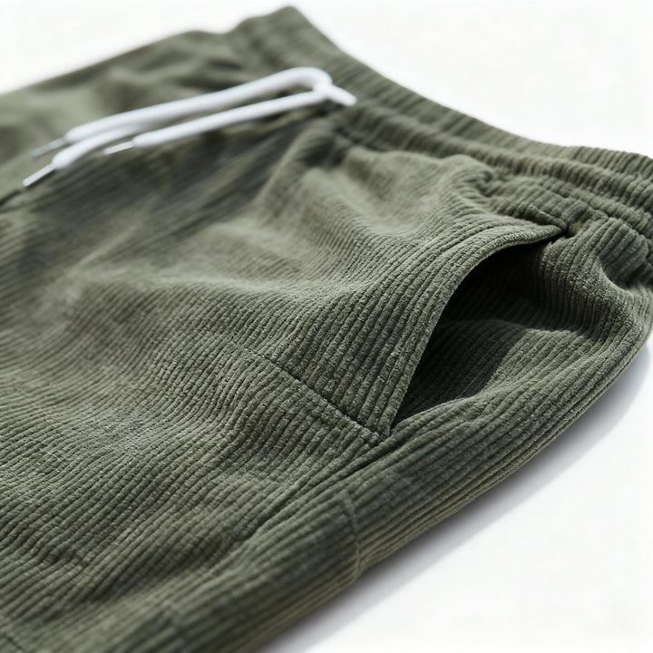 Comfortable men's drawstring swim shorts with elastic waist for active summer wear.
