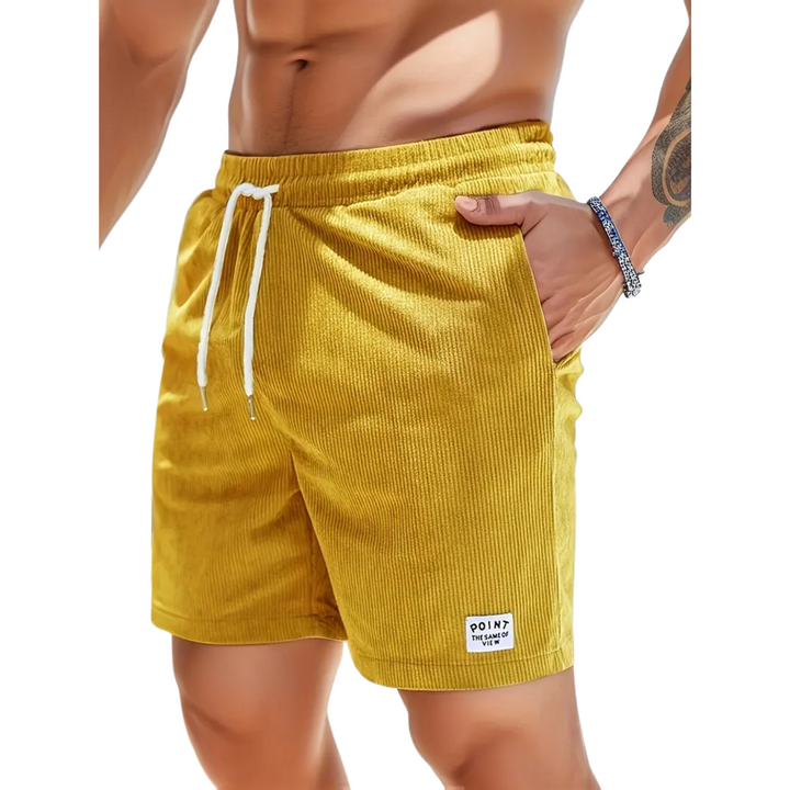 Essential men's vacation swim shorts, comfortable elastic waist & drawstring for easy wear.