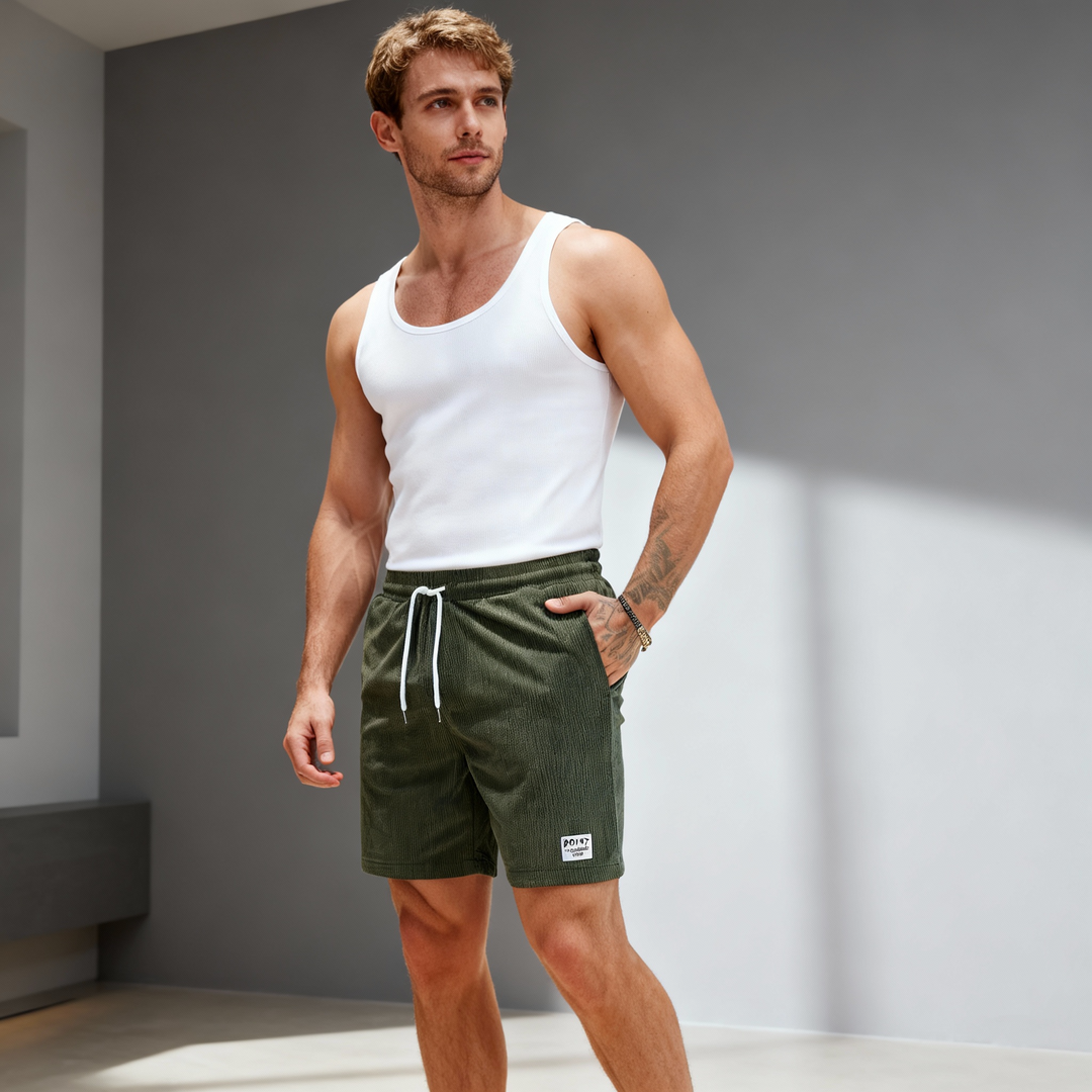 Men's comfortable elastic waist swim shorts, perfect for summer beach & pool days.
