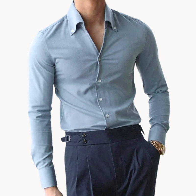 Men's slim fit long sleeve tight shirt in a polished style, perfect for formal or business casual wear.
