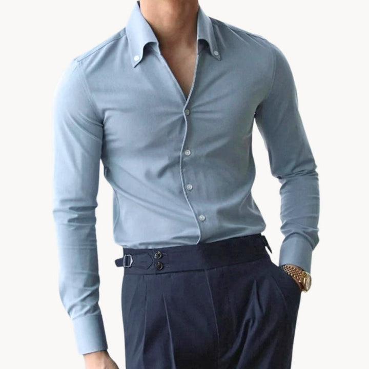 Men's slim fit long sleeve tight shirt in a polished style, perfect for formal or business casual wear.