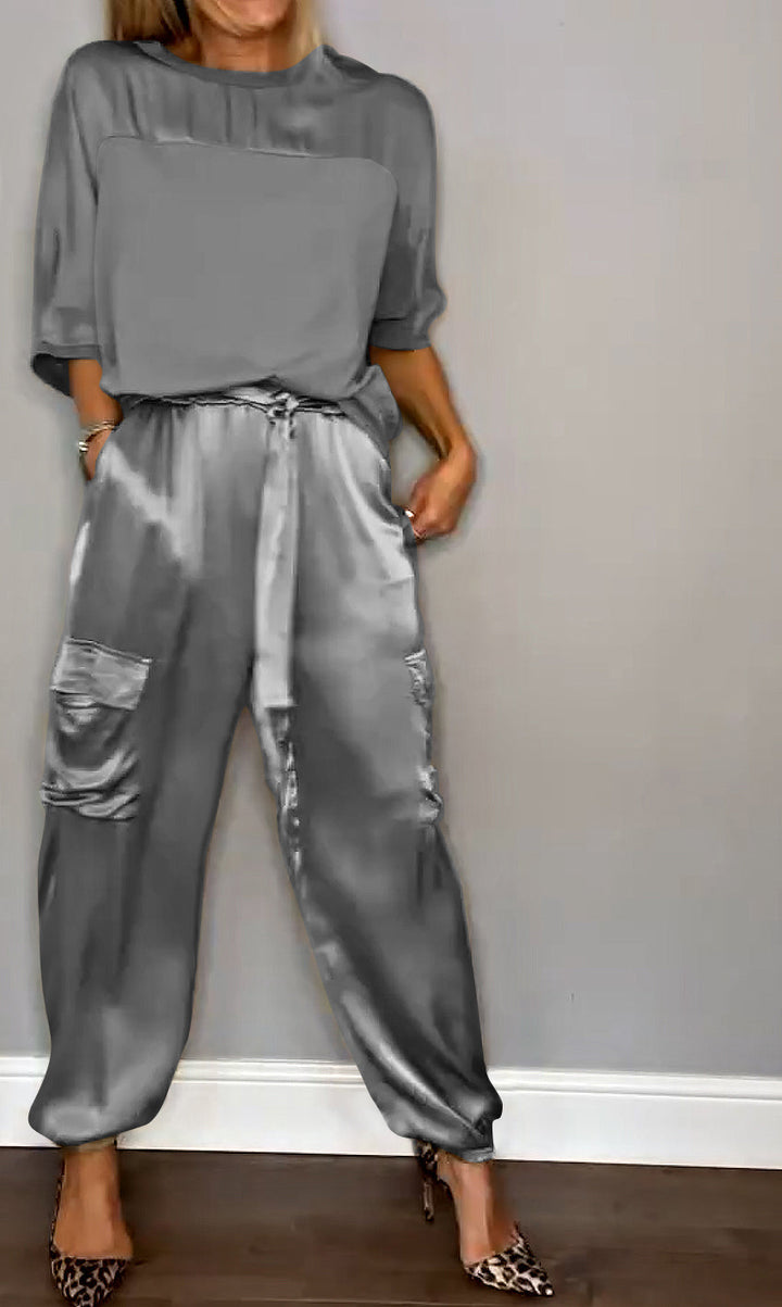 Close-up of the soft, shimmering fabric of the MIA Women's satin loungewear set.