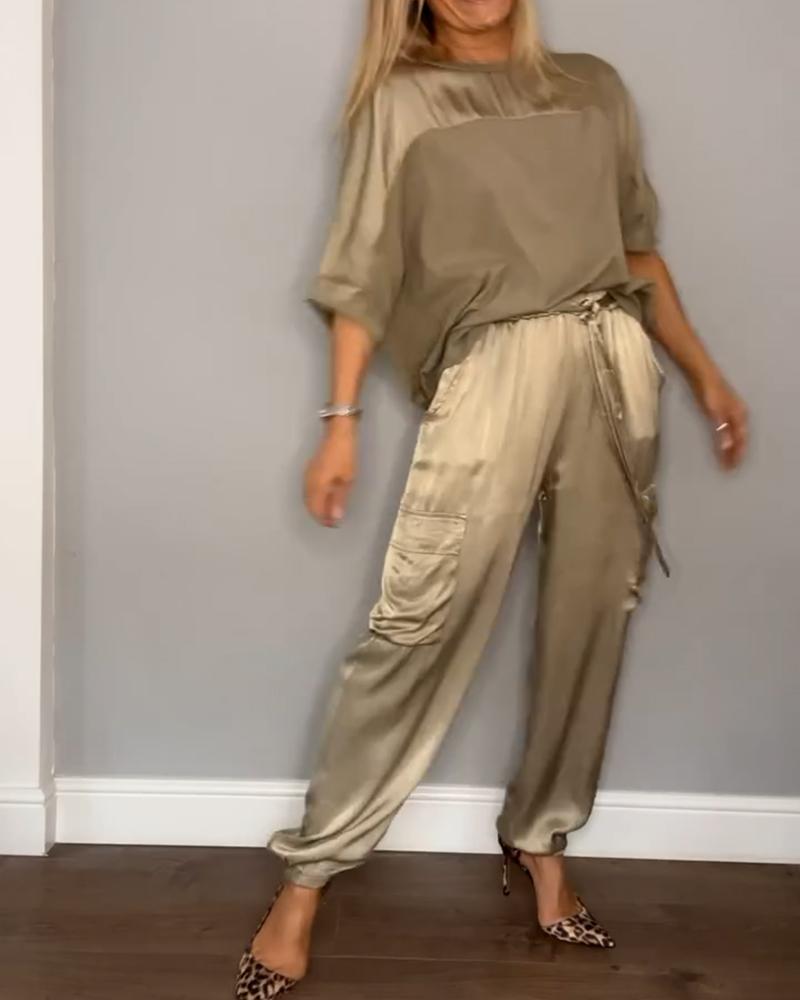 Full body shot of MIA Women's fashionable two-piece satin suit for stylish comfort.