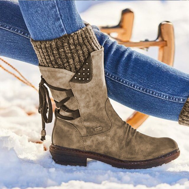Fashionable Bianca women's mid-calf snow boots. Warm, cozy, and slip-on for easy winter wear.