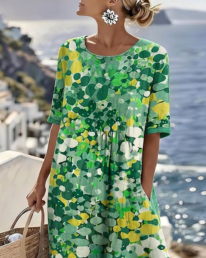 Effortless women's abstract floral midi dress with pockets, great for casual elegance.