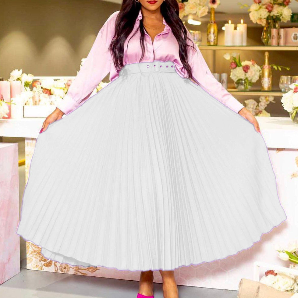 Versatile women's belted pleated midi skirt with a defined waist. Elegant fashion for all occasions.
