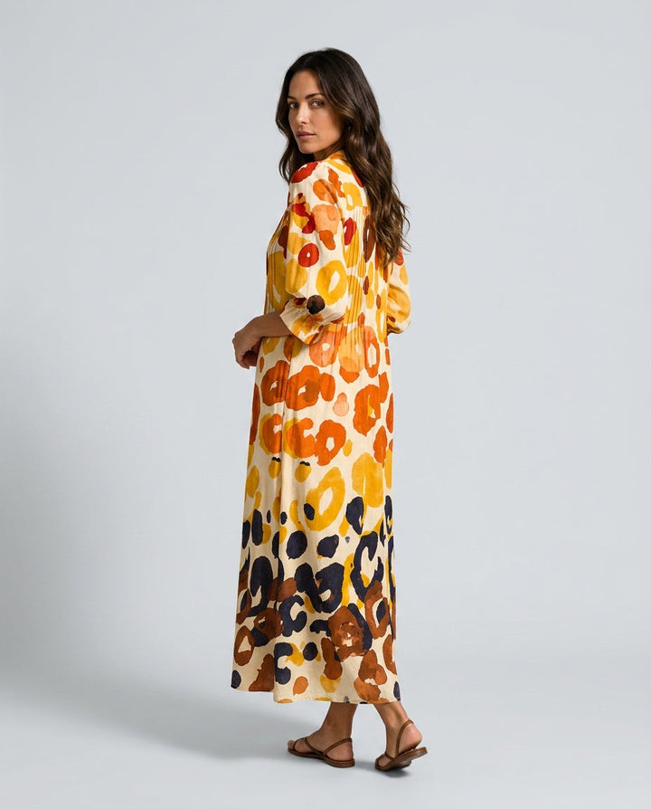 White floral print relaxed fit maxi dress for women, with a casual flowing design and elegant balloon sleeves.