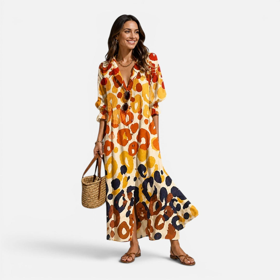 Casual women's orange floral maxi dress; a relaxed fit, flowing silhouette, and button front for summer fashion.