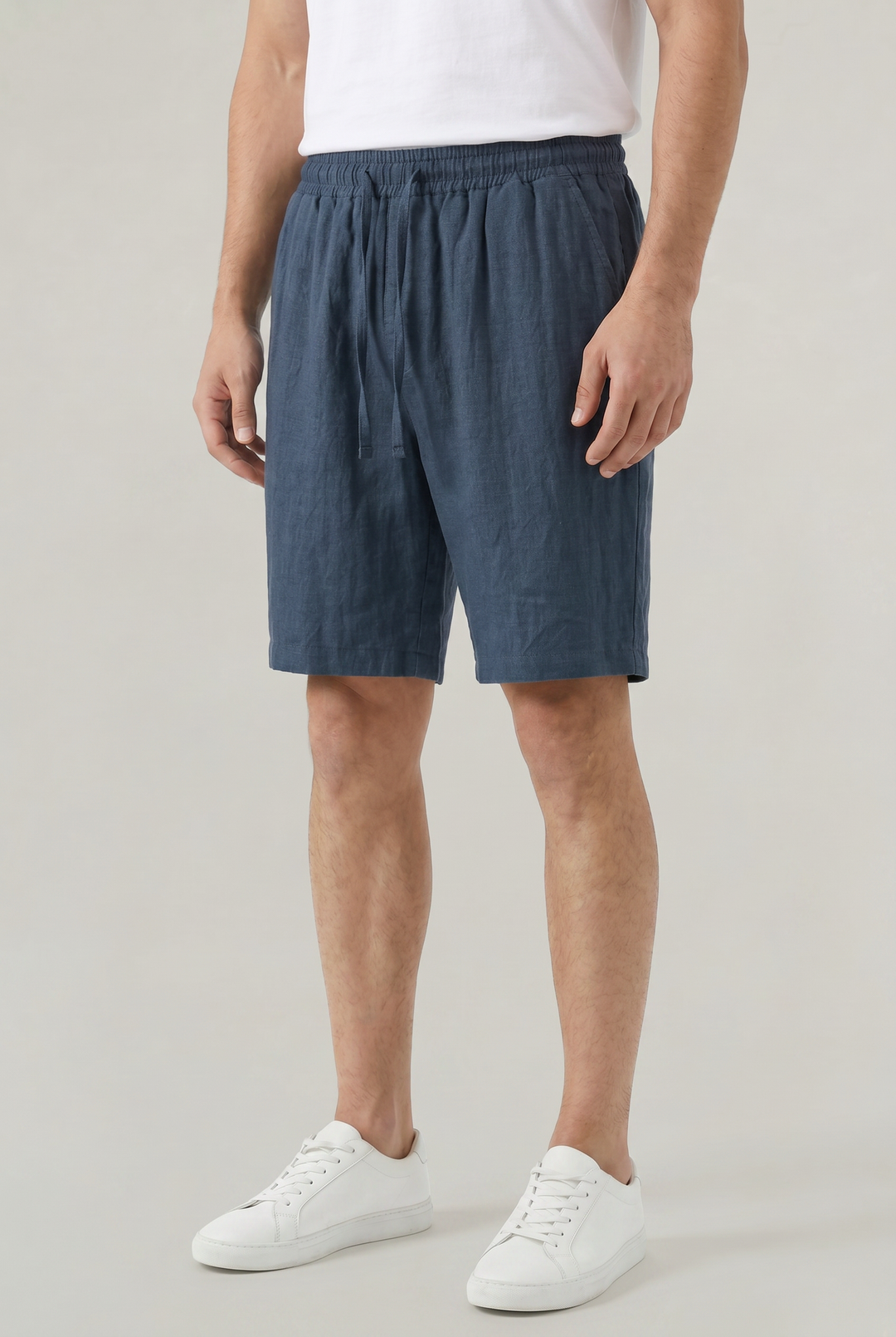 Men's navy linen relaxed fit shorts with elastic drawstring waist, perfect for summer casual wear and comfort.