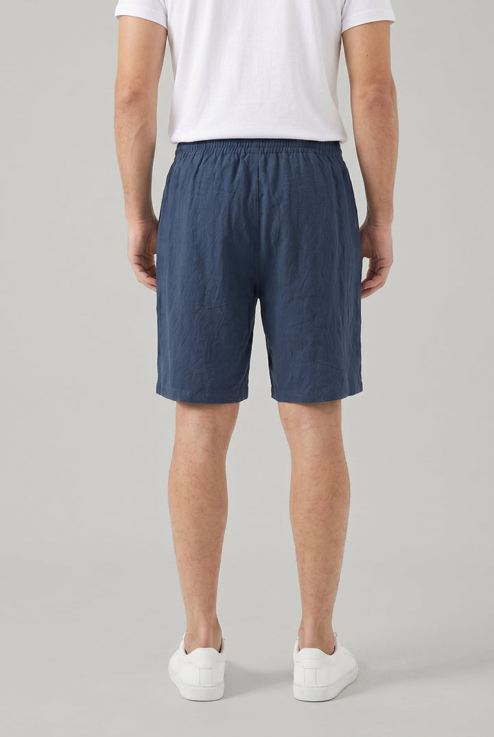 Relaxed fit men's casual linen shorts in navy with a comfortable drawstring waist, ideal for summer and everyday fashion.