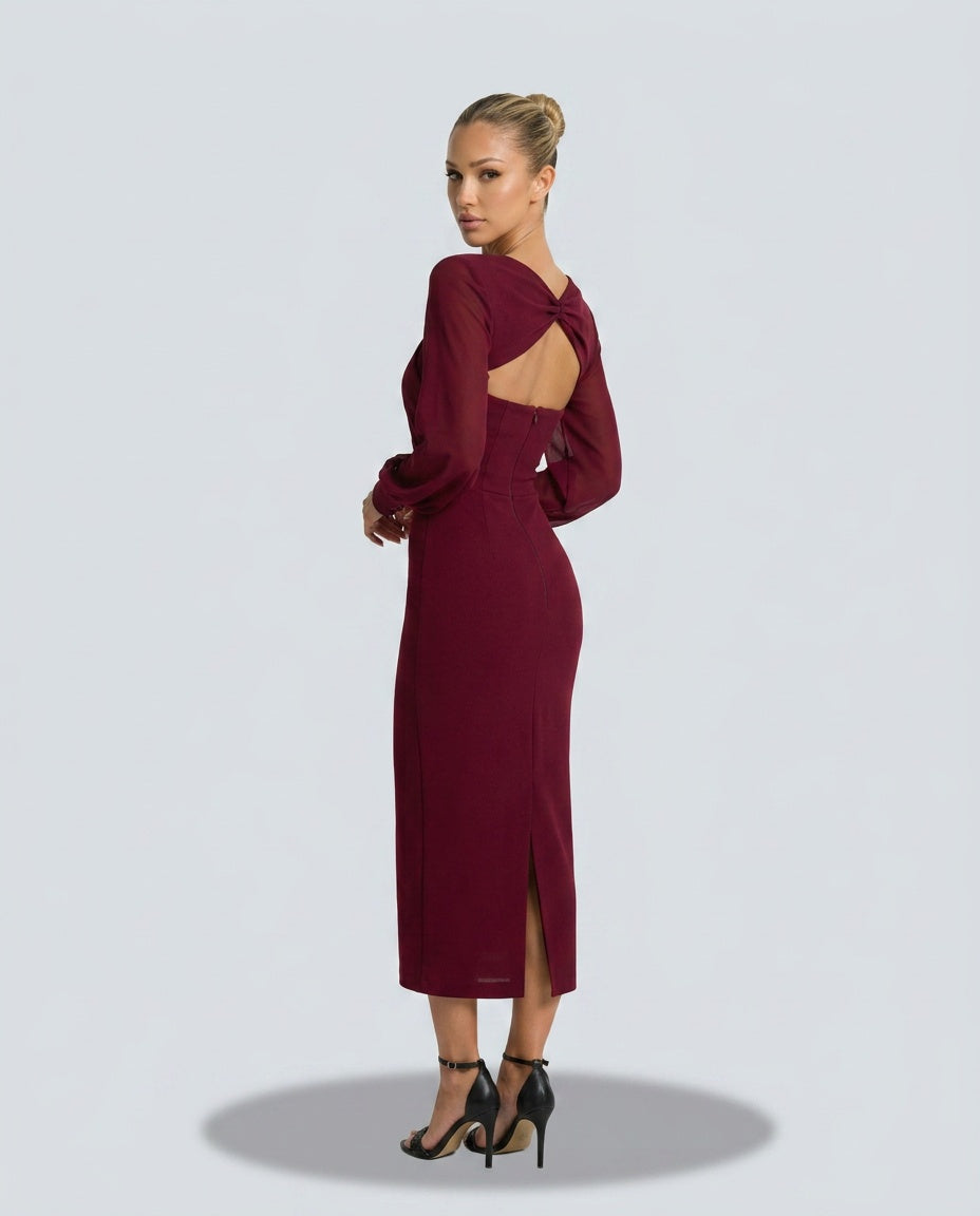 Sophisticated long sleeve midi dress, ideal for cocktail parties, evening wear & special occasions. Features twist front.
