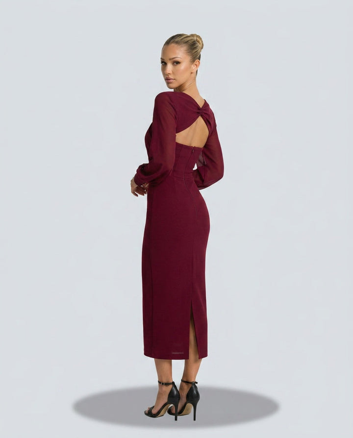 Sophisticated long sleeve midi dress, ideal for cocktail parties, evening wear & special occasions. Features twist front.