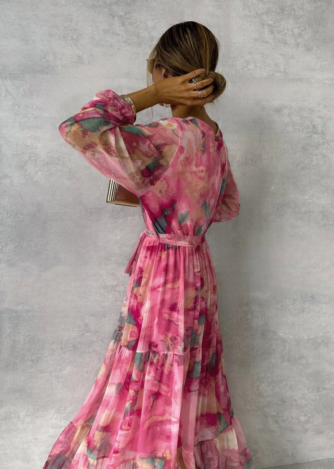 Stylish women's floral print maxi wrap dress, an elegant choice for races or summer fashion events.