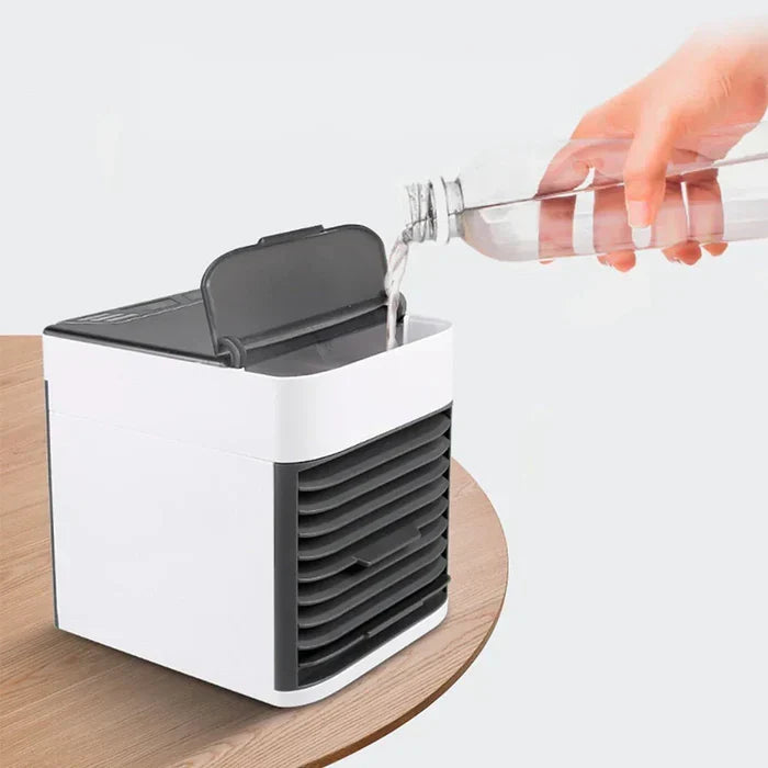 Portable mini air conditioner with LED light. USB-powered personal cooler, humidifier & air purifier for desk.
