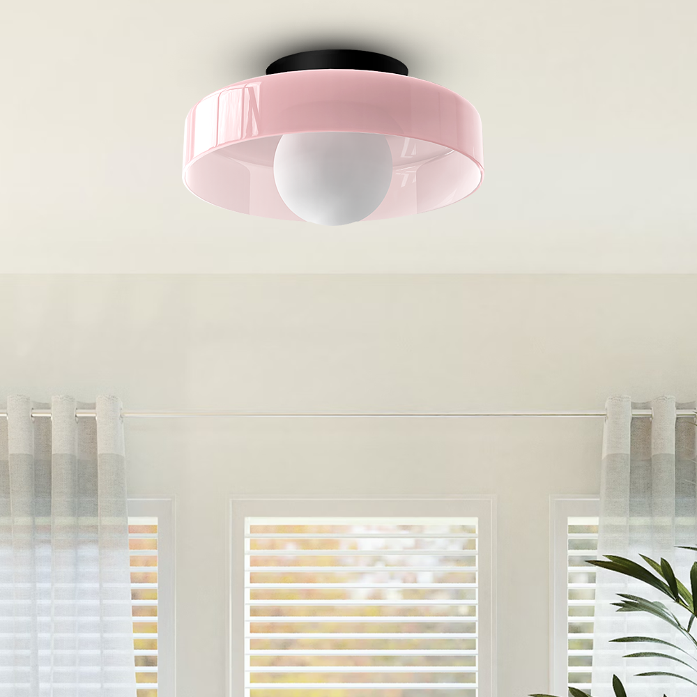 Contemporary flush mount ceiling light, providing soft illumination with a minimalist look.