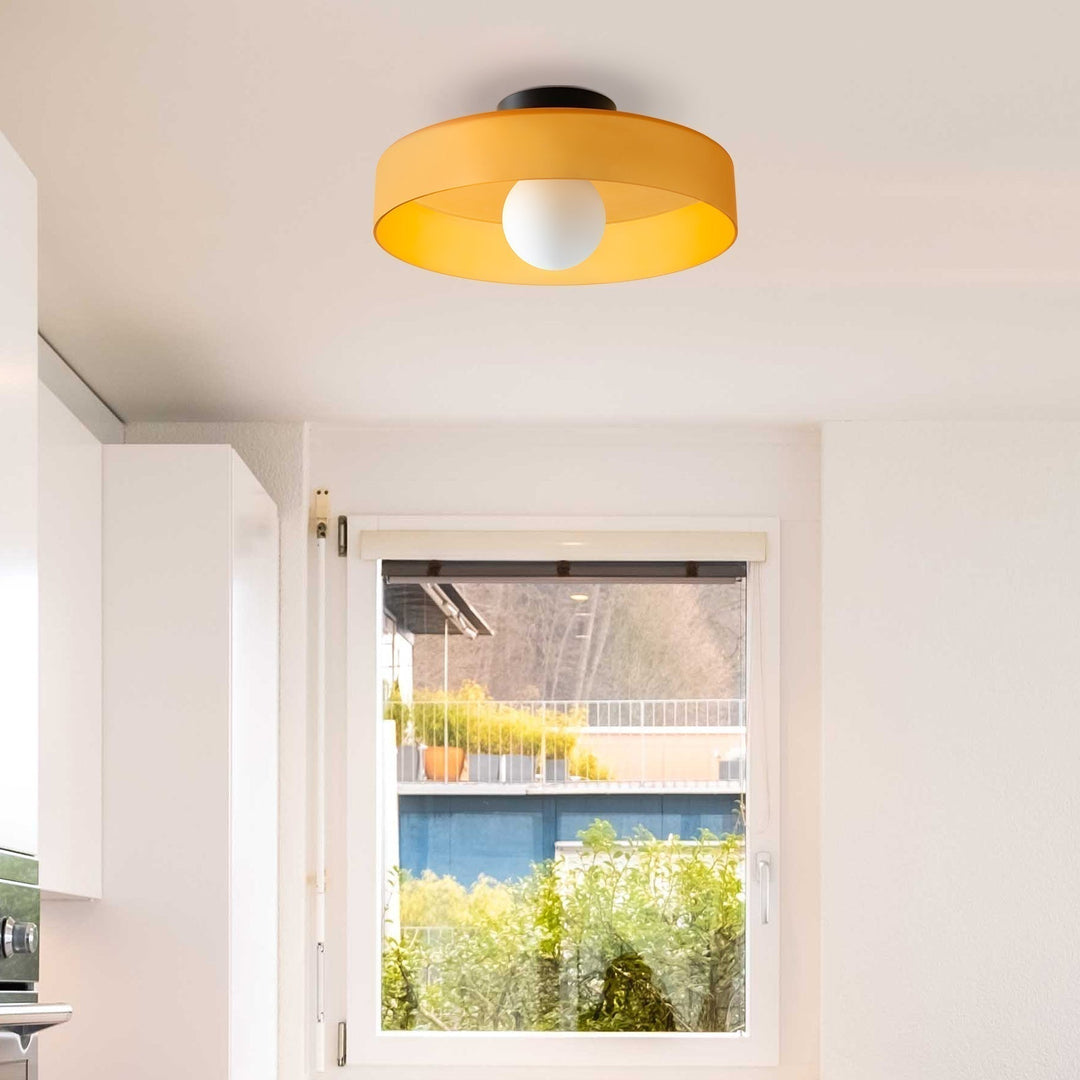 Versatile modern flush mount light fixture, ideal for bedroom, kitchen, or living room.