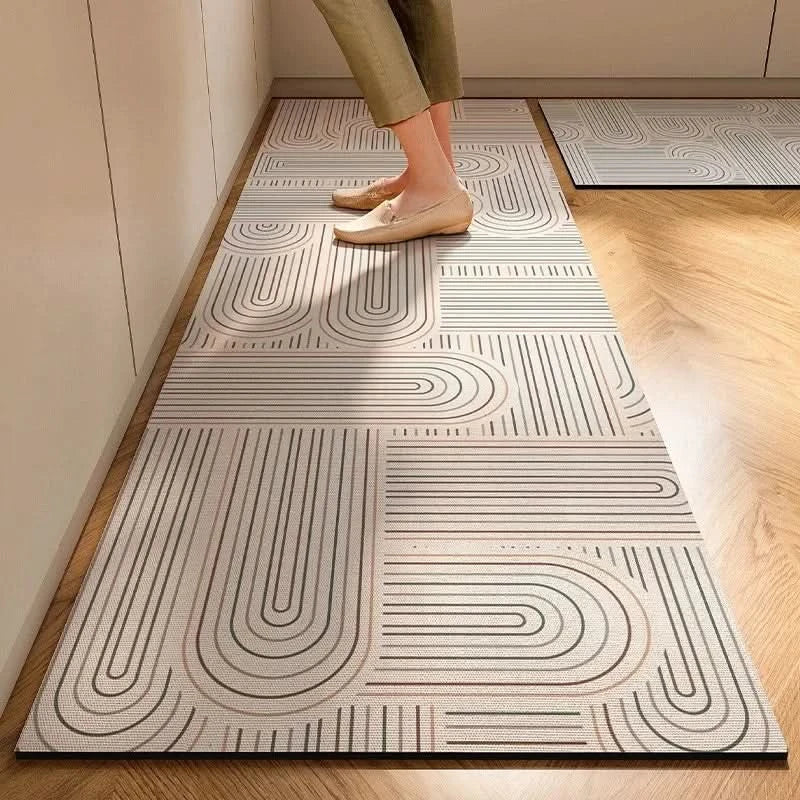 A stylish minimalist kitchen mat designed for anti-fatigue support and non-slip grip.