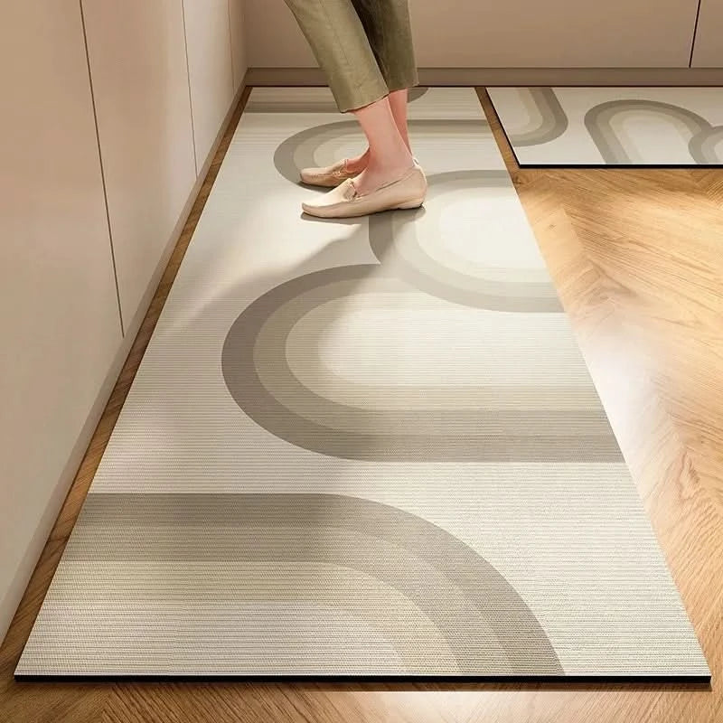 Modern minimalist kitchen decor featuring a comfortable and safe anti-fatigue floor mat.