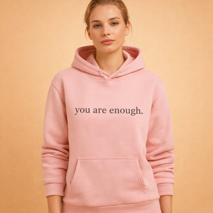 Soft women's oversized pullover hoodie with an inspiring slogan. Ideal for comfort and everyday casual fashion.
