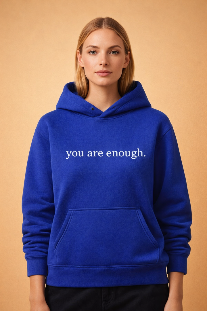 Stylish women's oversized pullover hoodie with an inspiring message. Comfortable and ideal for casual fashion.