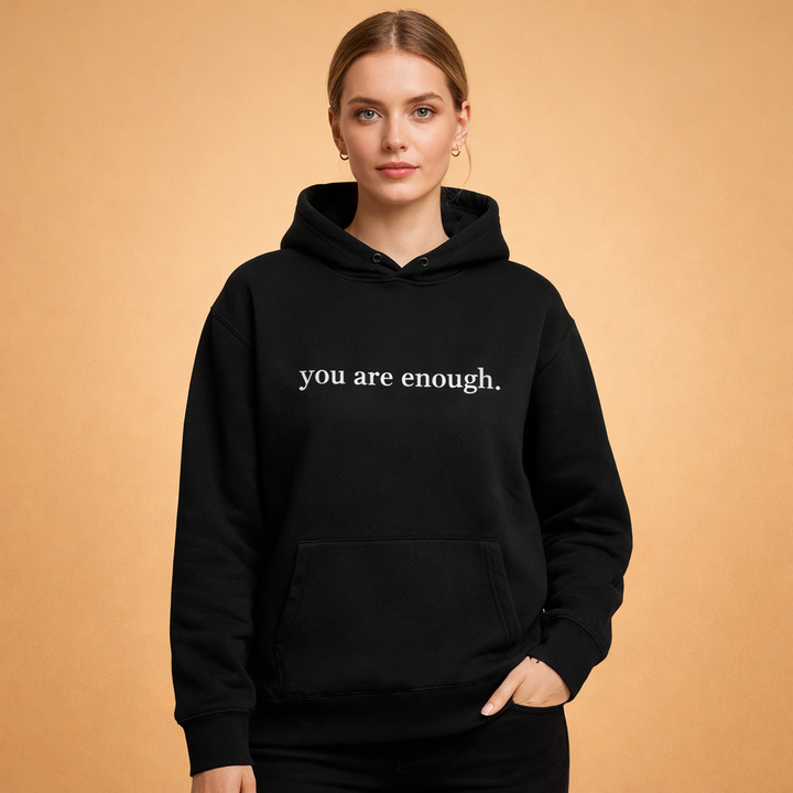 Casual women's oversized slogan hoodie with a positive message. Ideal for comfortable and stylish everyday wear.
