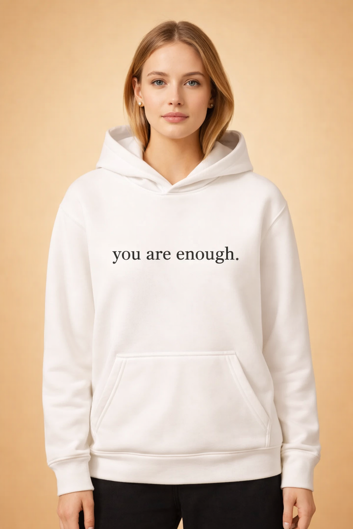 Comfortable women's oversized hoodie with an uplifting slogan. A relaxed fit hooded sweatshirt for casual style.