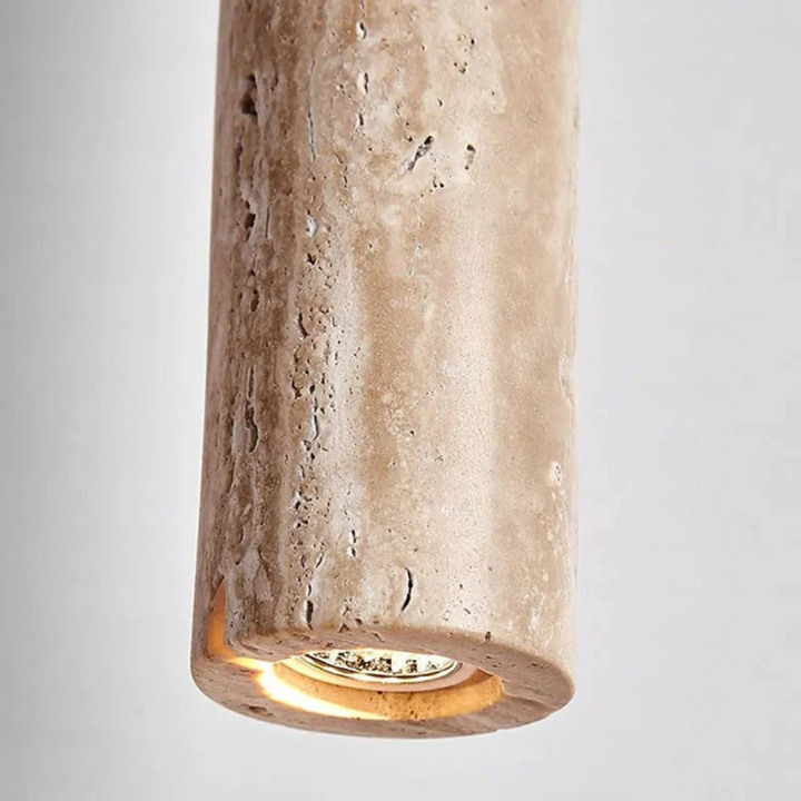 Elegant travertine LED chandelier, a statement piece of minimalist designer lighting.