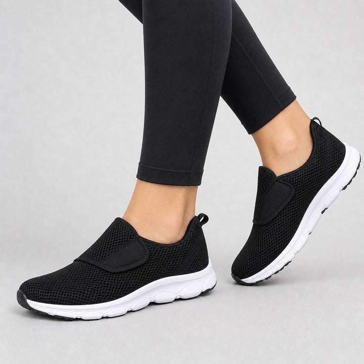 Women's wide fit slip-on walking shoes, offering superior comfort & support.