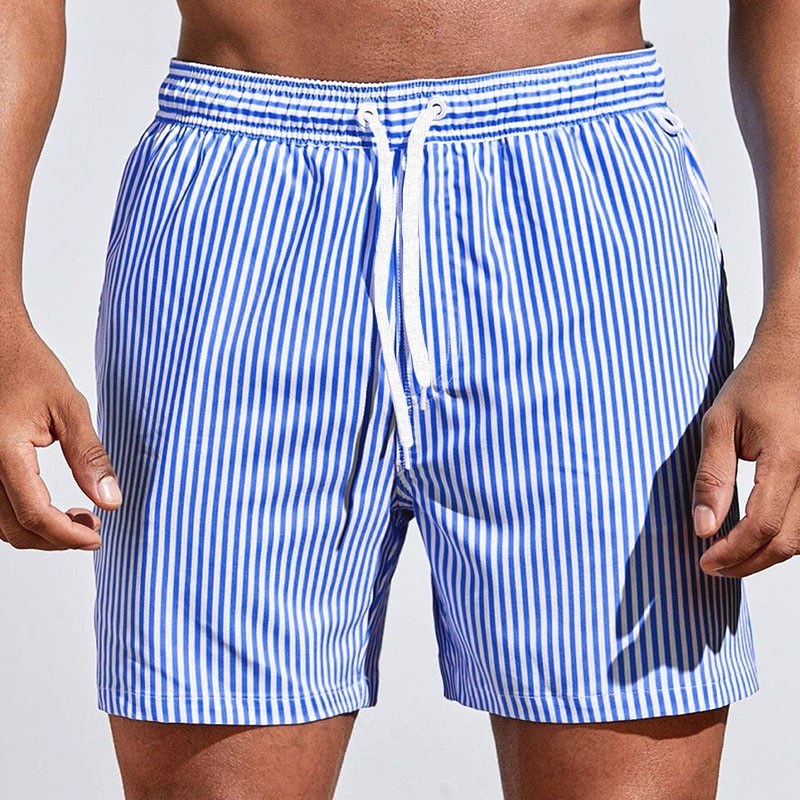 Men's striped drawstring swim shorts, relaxed fit for summer beachwear and casual vacation fun.