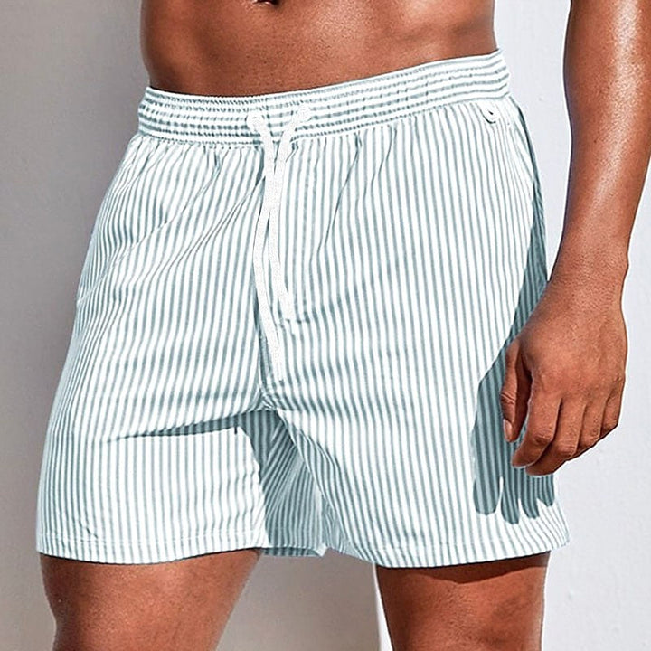 Men's summer striped swim shorts, drawstring waist, relaxed fit. Ideal beachwear and vacation casual shorts.