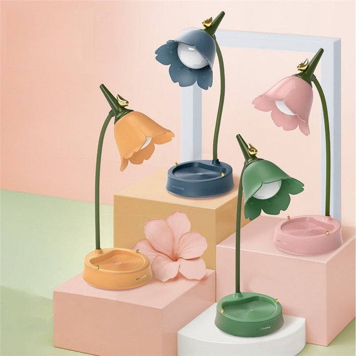Charming pink floral LED desk lamp, dimmable & portable, perfect for bedside or office.