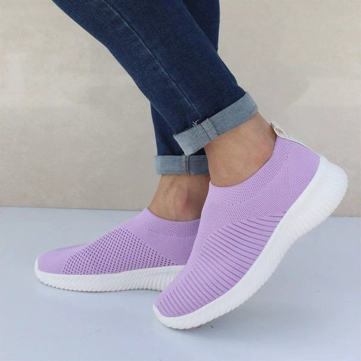 Women's comfortable slip-on sneakers for all-day breathable wear. Lightweight casual footwear.