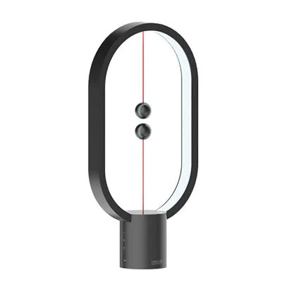 Elegant balance table lamp with a minimalist wood finish, providing soft ambient LED light.