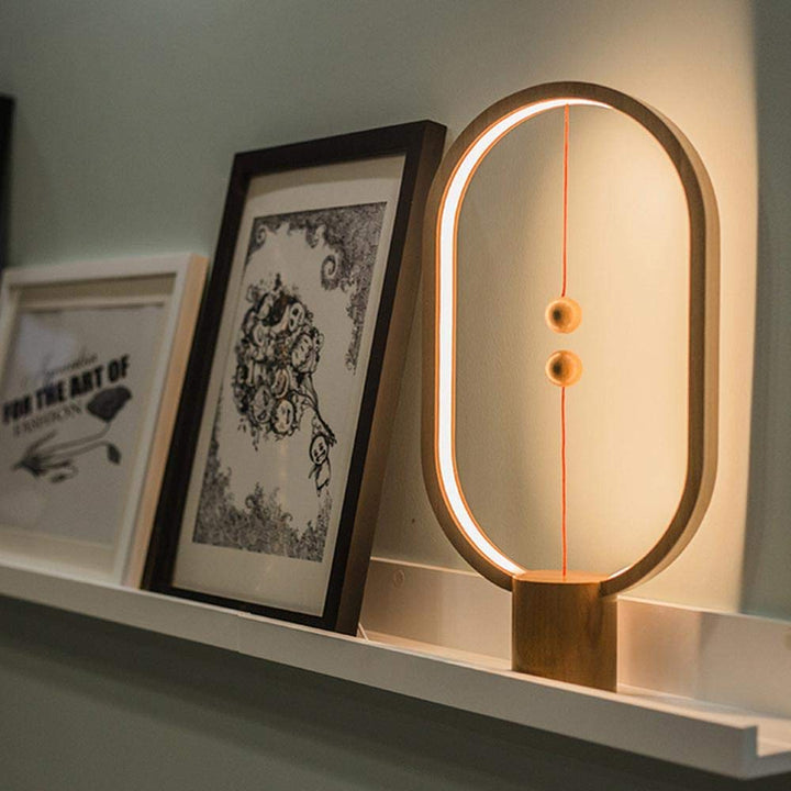 Stylish LED balance lamp, a modern desk accessory with an innovative floating on/off switch.