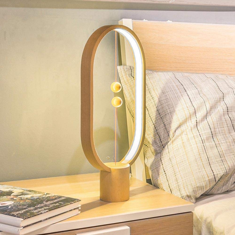 Minimalist LED table lamp, a colorful modern desk accessory with a captivating floating switch.