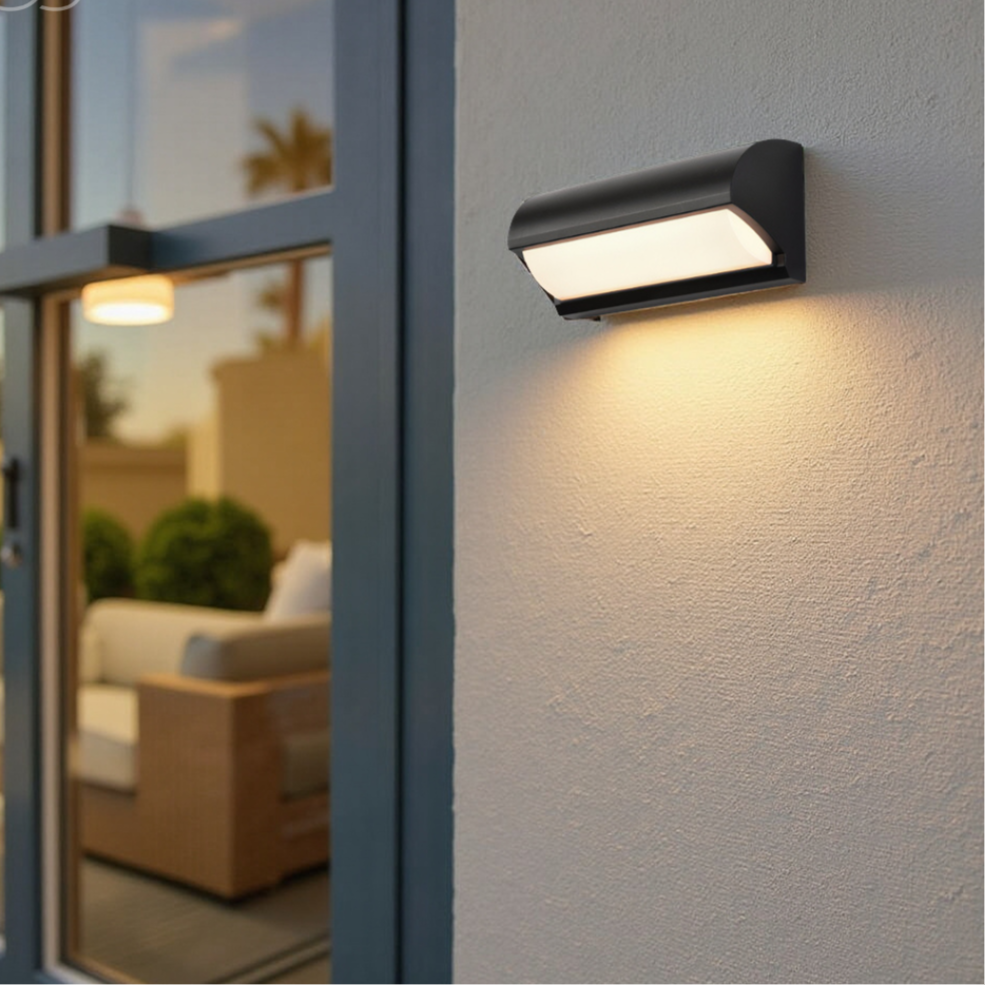 Versatile black modern outdoor LED wall light, weatherproof for garden, patio, and entryway lighting.